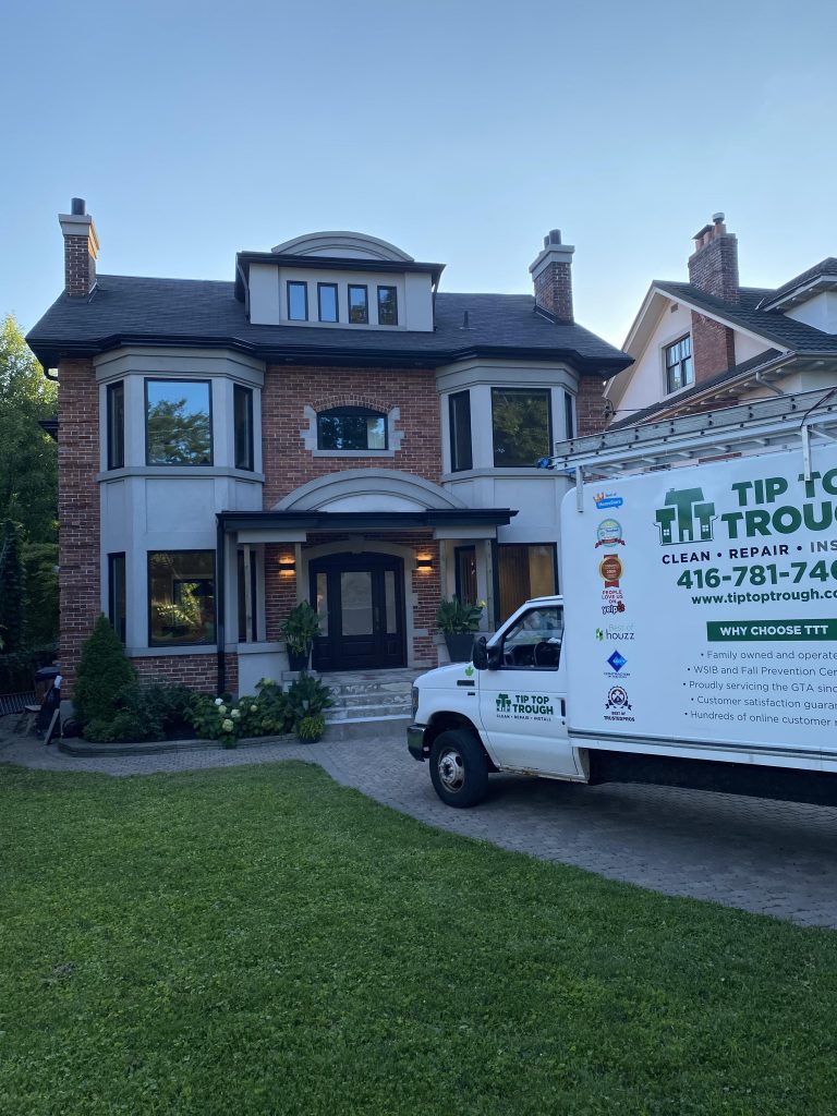 Beautiful home exterior with professional eavestroughs by Tip Top Trough